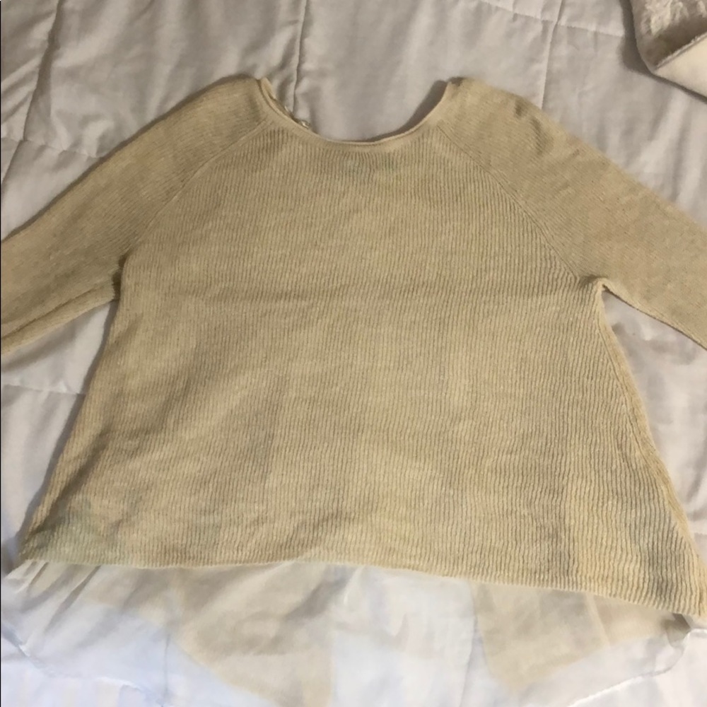 Crochet sweater with open back detail